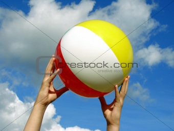 hands with beach ball