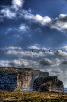 A HDR scenic view of Fungus Rock on the coast of Gozo in the Med