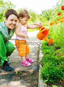 Mother and daughter in garden