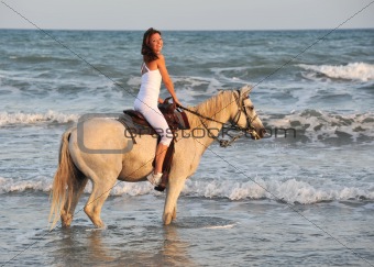 riding woman in sea