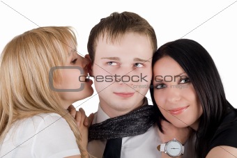 Portrait of the young man and two young women. Isolated