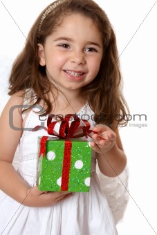Angelic girl holding a gift