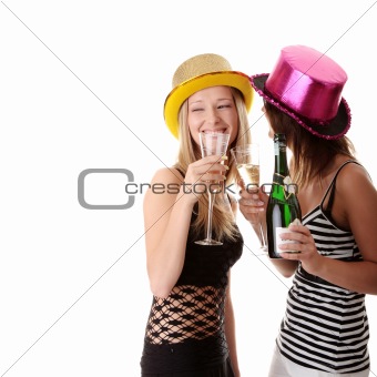 Two casual young women enjoying champagne