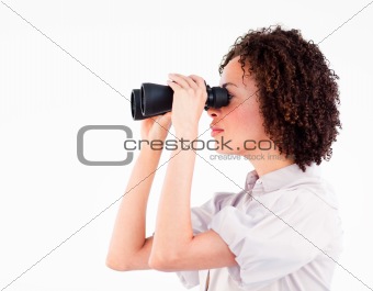 Portrait of attractive businesswoman using binoculars