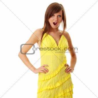 Beautiful brunette girl in yellow dress.