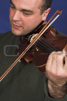 portrait of man playing violon