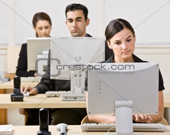 Business people working on computers