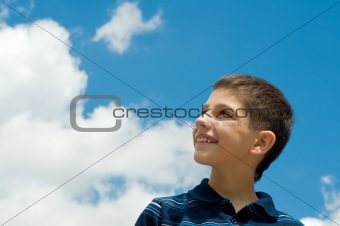 boy at the clouds