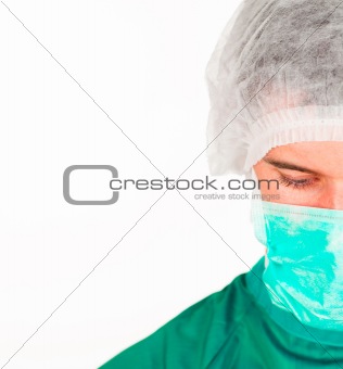 Portrait of a surgeon looking downwards