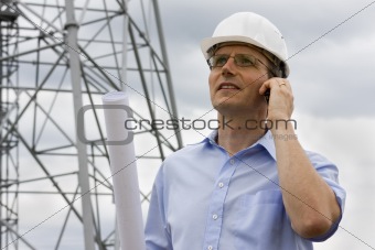 Engineer with mobile phone