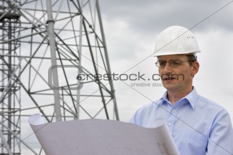 Engineer reading a plan