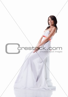 Beautiful young female wearing white dress in antique style isolated on white