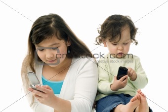 Children with mobile phones.