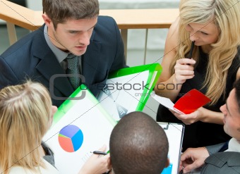 High angle of usiness team having a meeting on stairs