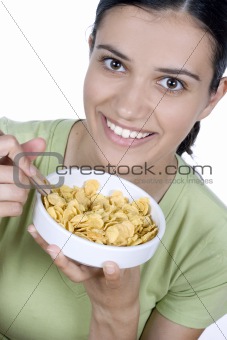 girl eating cornflakes
