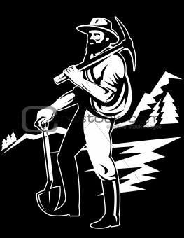 Coal miner with pick axe standing