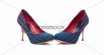 Pair of high-heeled blue and red shoes isolated on white