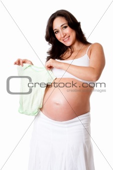Pregnant woman holding baby bodysuit