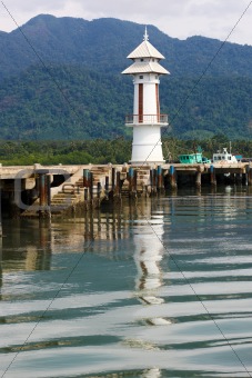 White lighthouse in bay on Koh Chang island