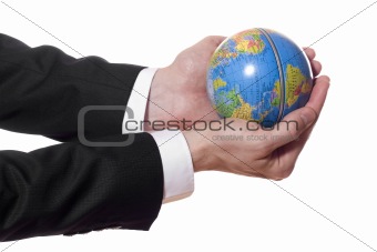 businessman holding mini globe isolated on white