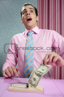 Businessman with dollar note on mouse trap