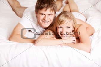 Young couple in a bed