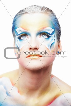 Portrait of beautiful model with butterfly body painting isolated on white