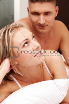 Young couple in a bed