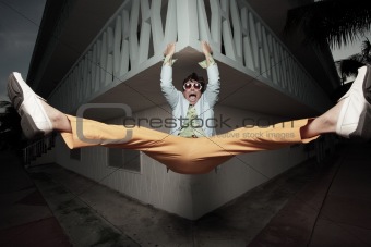 Man hanging from a ledge