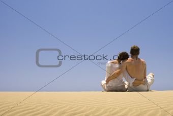 Young couple hugging on the beach in Gran Canaria
