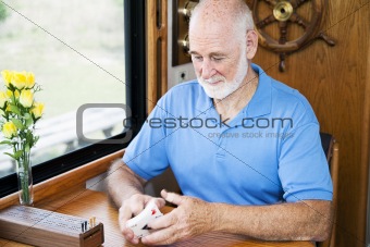 Senior Man Shuffles Cards
