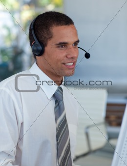 Hispanic businessman working in a call center