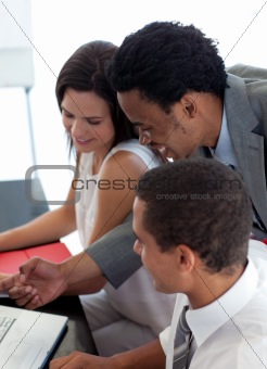 Afro-American businessman working with his colleagues