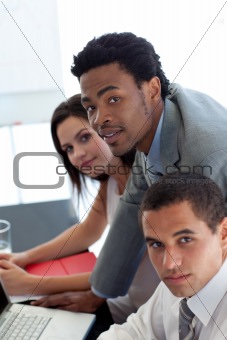 Afro-American businessman working with his team