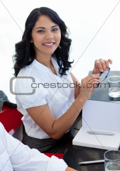 Businesswoman with glasses working in a meeting