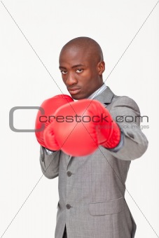 Afro-American businessman boxing