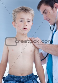 Doctor listening to a child with stethoscope