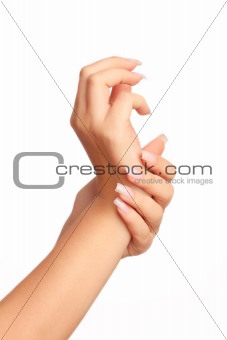 Beautiful woman hands with manicure isolated on white background