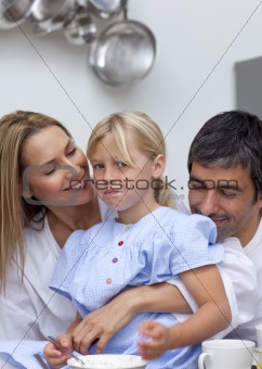 Daughter disliking food with her parents