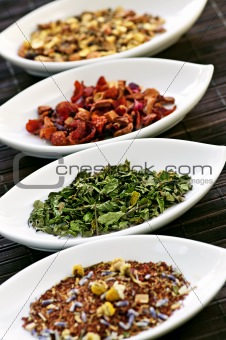 Assorted herbal wellness dry tea in bowls