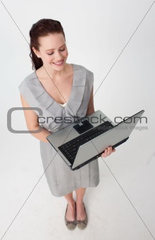 High angle of a beautiful businesswoman using a laptop