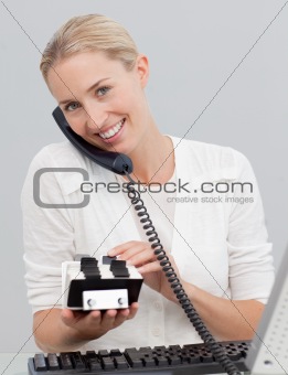 Businesswoman on phone and searching the index