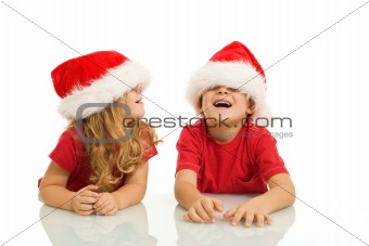 Kids having fun with christmas hats