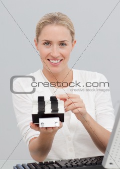 Businesswoman holding an index holder
