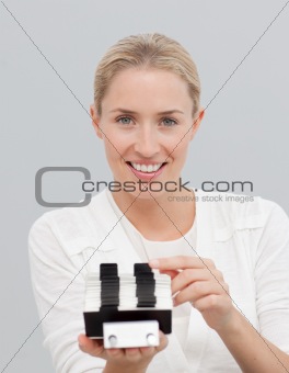 Businesswoman holding an index holder