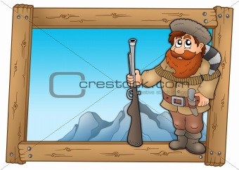 Cartoon trapper in wooden frame