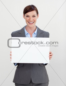 Attractive businesswoman holding white card