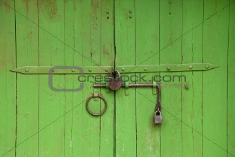 Medieval gate painted in green