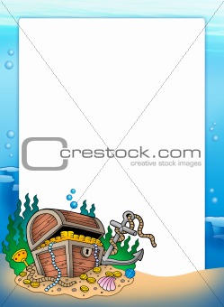 Frame with treasure chest in sea