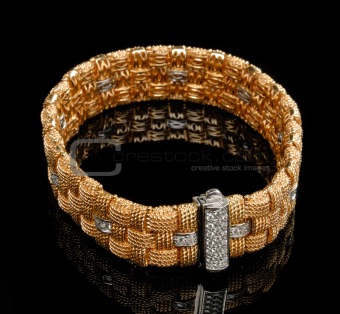 Golden bracelet with diamonds